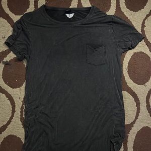 Oversized soft cloth work out shirt. Big collar and opens at bottom